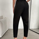 Pantalones conicos unicolor de cintura elastica