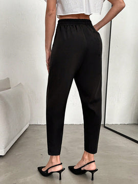 Pantalones conicos unicolor de cintura elastica
