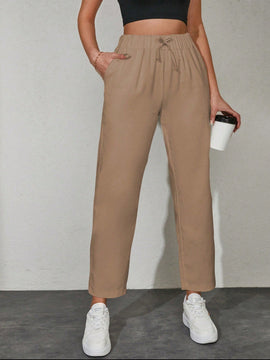 Pantalones unicolor con bolsillo oblicuo de cintura con cordon