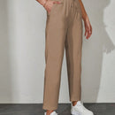 Pantalones unicolor con bolsillo oblicuo de cintura con cordon