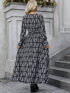 Vestido con cinturon con estampado de pluma de manga farol