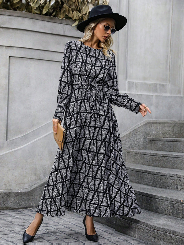Vestido con cinturon con estampado de pluma de manga farol
