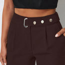 Pantalones zanahoria con bolsillo oblicuo liso