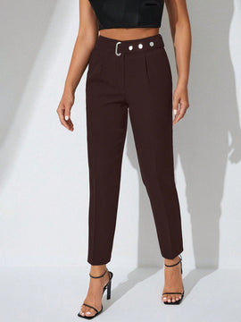 Pantalones zanahoria con bolsillo oblicuo liso