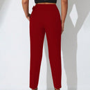 Pantalones zanahoria con bolsillo oblicuo liso