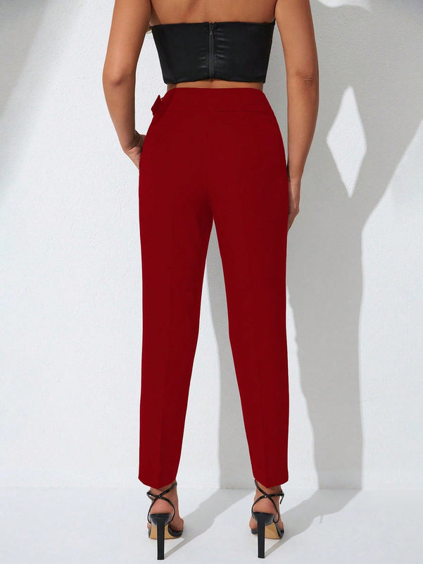 Pantalones zanahoria con bolsillo oblicuo liso