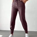 Pantalones con punos elasticos y cintura con cordon de color liso para mujer
