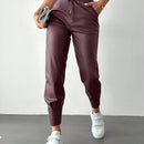 Pantalones con punos elasticos y cintura con cordon de color liso para mujer