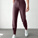 Pantalones con punos elasticos y cintura con cordon de color liso para mujer