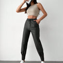 Pantalones con punos elasticos y cintura con cordon de color liso para mujer