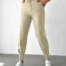 Pantalones con punos elasticos y cintura con cordon de color liso para mujer