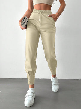 Pantalones con punos elasticos y cintura con cordon de color liso para mujer