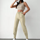 Pantalones con punos elasticos y cintura con cordon de color liso para mujer