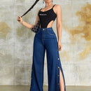 Jeans unicolor con boton lateral