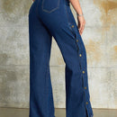 Jeans unicolor con boton lateral