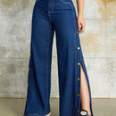 Jeans unicolor con boton lateral