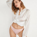 Leisure extremadamente elastico, sin costuras y comodo tanga de color rosa claro, de baja altura, de tamano mini, amigable con la piel