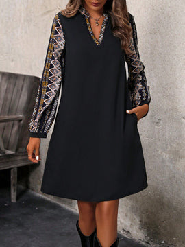 Vestido con patron geometrico de manga farol escote V