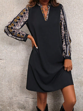 Vestido con patron geometrico de manga farol escote V