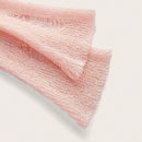 ICON Jersey crop unicolor bajo asimetrico