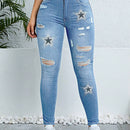 Pantalones ajustados y elasticos para mujer con detalles rasgados y estampado de estrellas