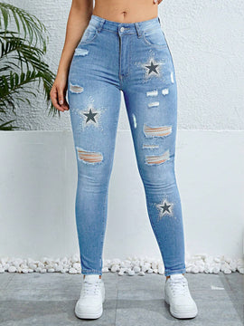 Pantalones ajustados y elasticos para mujer con detalles rasgados y estampado de estrellas
