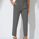Pantalones zanahoria con bolsillo oblicuo liso