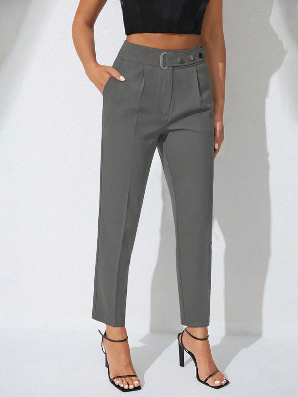 Pantalones zanahoria con bolsillo oblicuo liso
