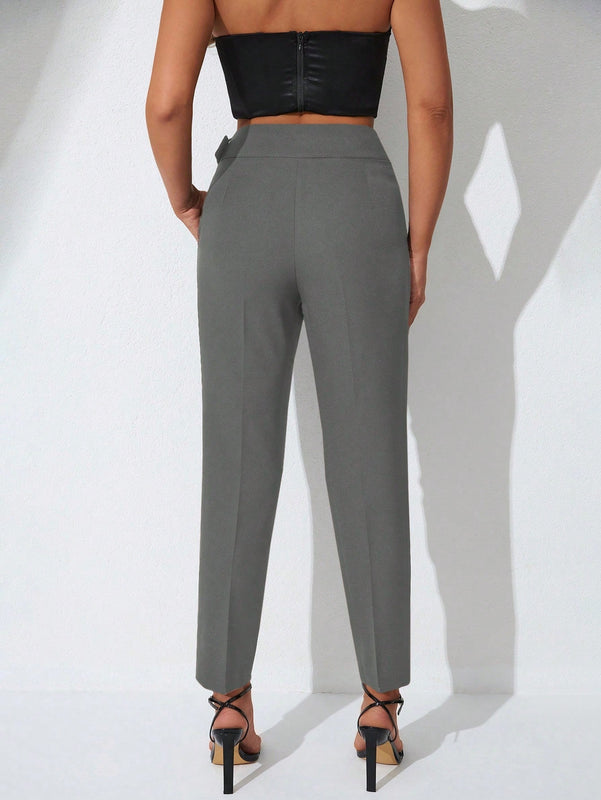 Pantalones zanahoria con bolsillo oblicuo liso