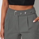 Pantalones zanahoria con bolsillo oblicuo liso