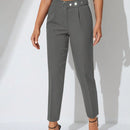 Pantalones zanahoria con bolsillo oblicuo liso
