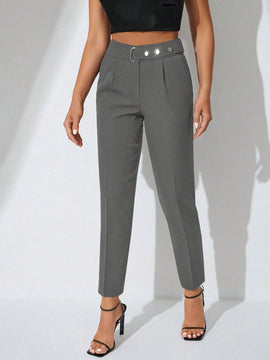 Pantalones zanahoria con bolsillo oblicuo liso