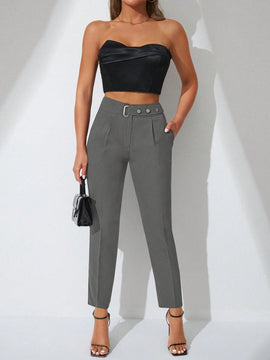 Pantalones zanahoria con bolsillo oblicuo liso