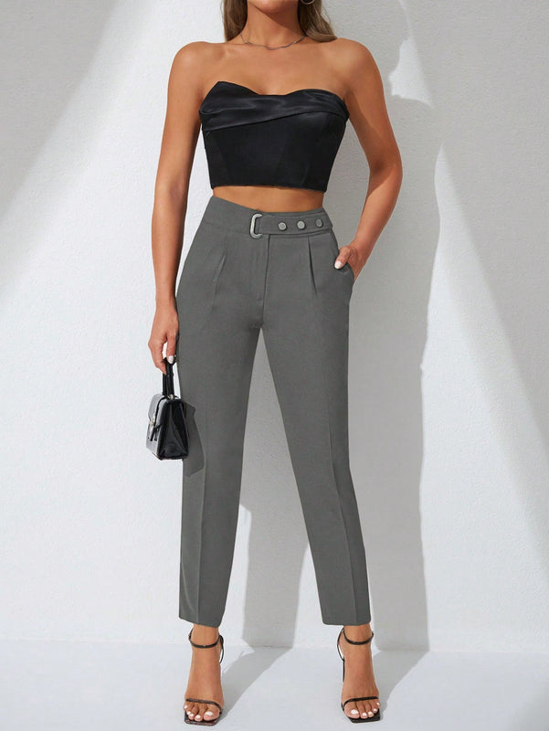 Pantalones zanahoria con bolsillo oblicuo liso