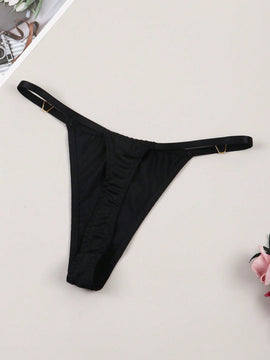 Tanga para senoras sexy y sencilla con decoracion metalica y patron impreso de letras