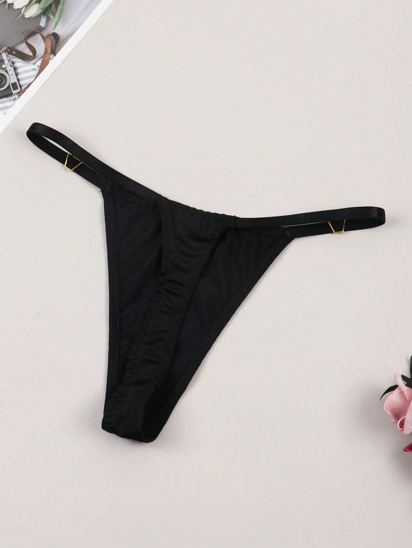 Tanga para senoras sexy y sencilla con decoracion metalica y patron impreso de letras