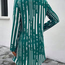 Vestido camisero con estampado de rayas de manga enrollada con boton