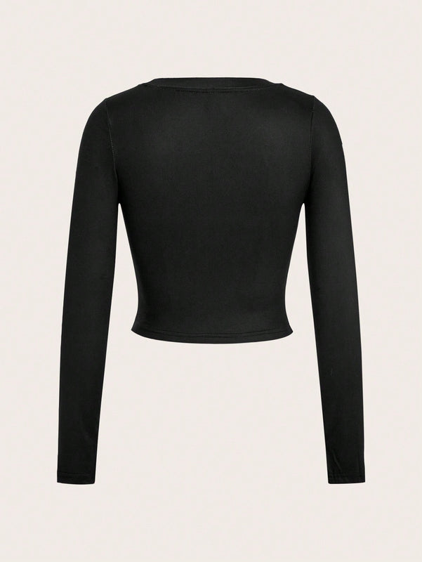 Camiseta crop con estampado de dibujo