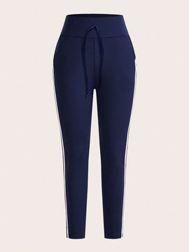 Pantalones Elasticos Skinny Con Rayas En Los Lados Y Detalle De Nudo En La Cintura Para Mujeres