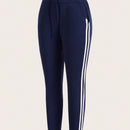 Pantalones Elasticos Skinny Con Rayas En Los Lados Y Detalle De Nudo En La Cintura Para Mujeres
