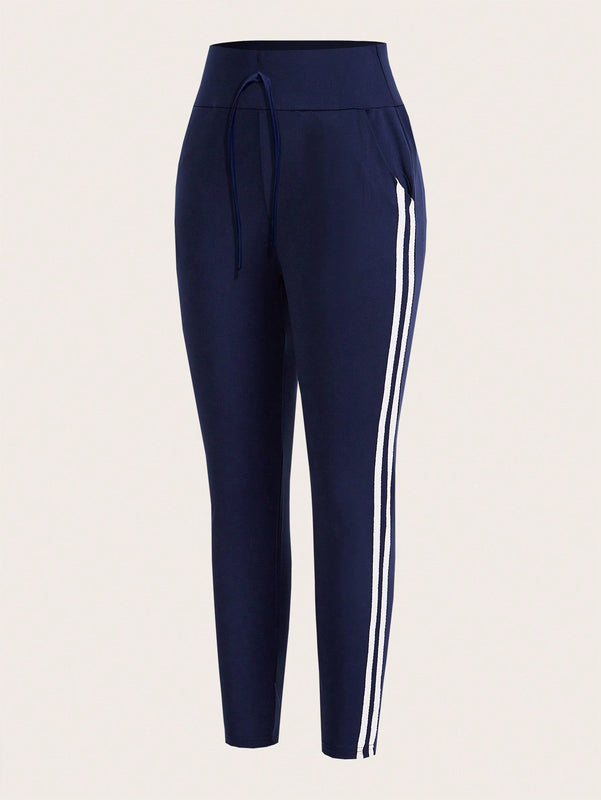 Pantalones Elasticos Skinny Con Rayas En Los Lados Y Detalle De Nudo En La Cintura Para Mujeres