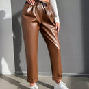 Pantalones largos de tela metalica con nudo frontal para mujer