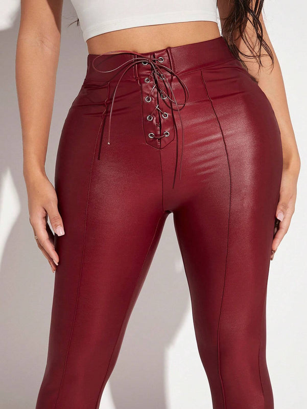 SXY Pantalones ajustados con cordon delantero bajo con abertura PU
