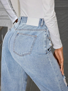 Jeans Lavados Y Desgastados Con Estampado De Carton