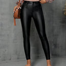Pantalones ajustados con costura frontal en unicolor