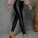 Pantalones ajustados con costura frontal en unicolor