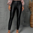 Pantalones ajustados con costura frontal en unicolor