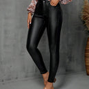 Pantalones ajustados con costura frontal en unicolor