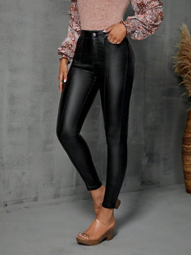 Pantalones ajustados con costura frontal en unicolor