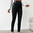 Pantalones ajustados de talle alto con diseno de boton